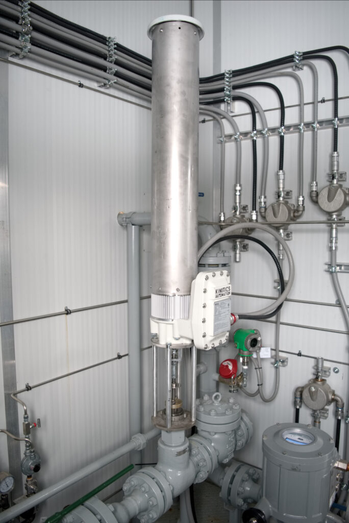 Kinitics KVA38 valve actuator with stainless tube mounted on a CVS D-body control valve in a process building